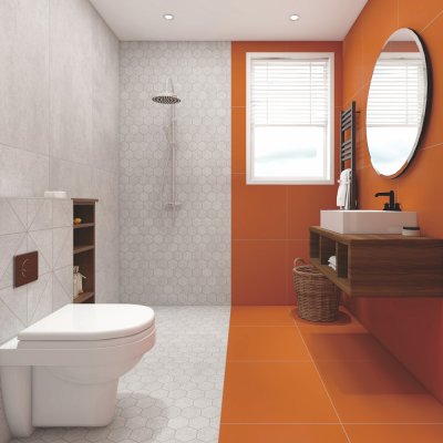 A Bathroom scene, beautifully tiled with stunning Coral orange Subway and Mosaic tiles