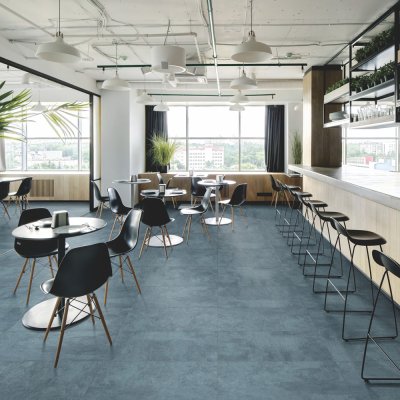 A kitchen scene, beautifully tiled with stunning blue/greens Subway and Hexagon tiles