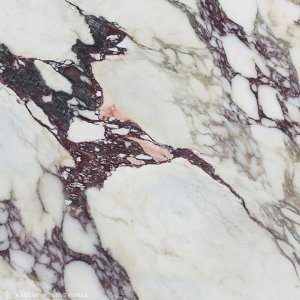 A marble tile, white with violet in color to suit any bathroom space, designed by Greg Natale.