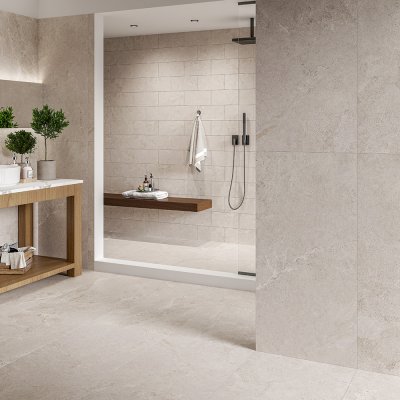 A bathroom scene, beautifully tiled with stunning beige Bullnose with drop edge tiles