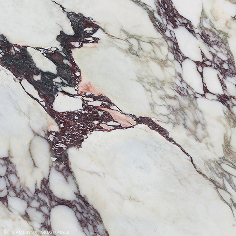 A marble tile, white with violet in color to suit any bathroom space, designed by Greg Natale.